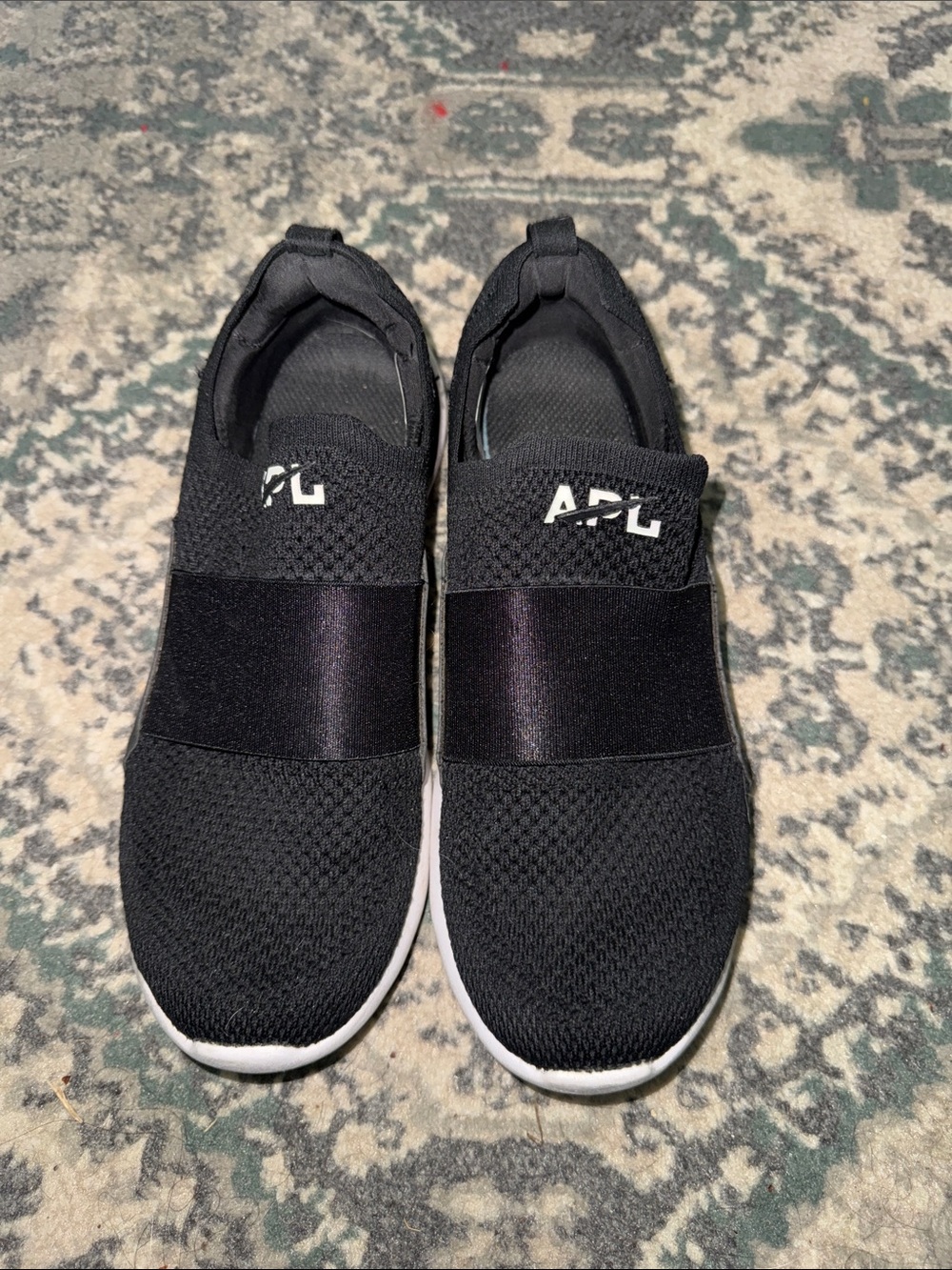 APL Black Slip-On Athletic Sneakers with White Soles